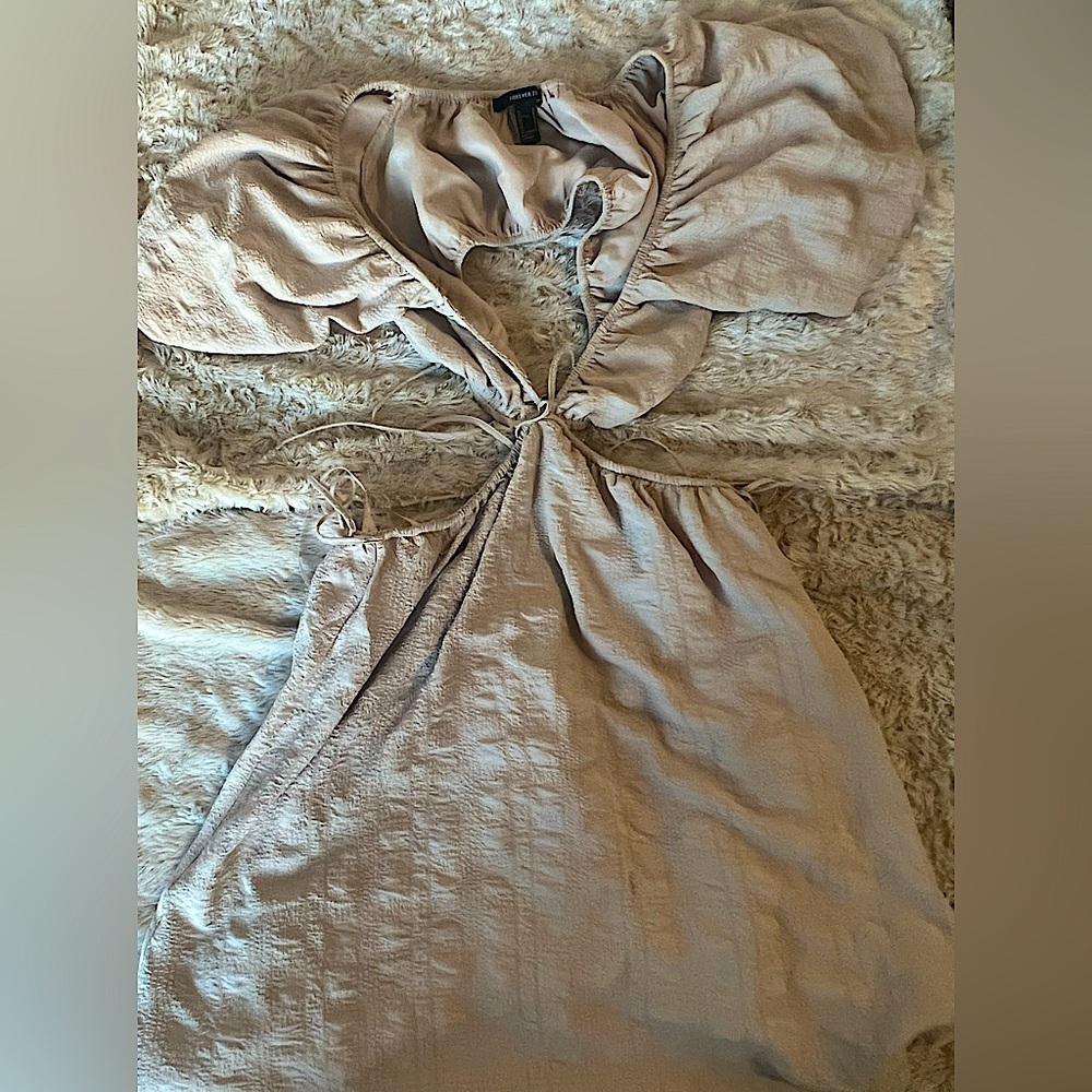 Forever 21 Beige Dress with cut outs. Cut outs are adjustable to waist size.